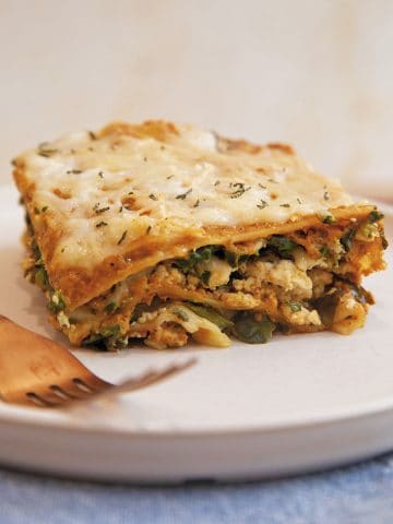 piece of pumpkin lasagna on a plate with fork