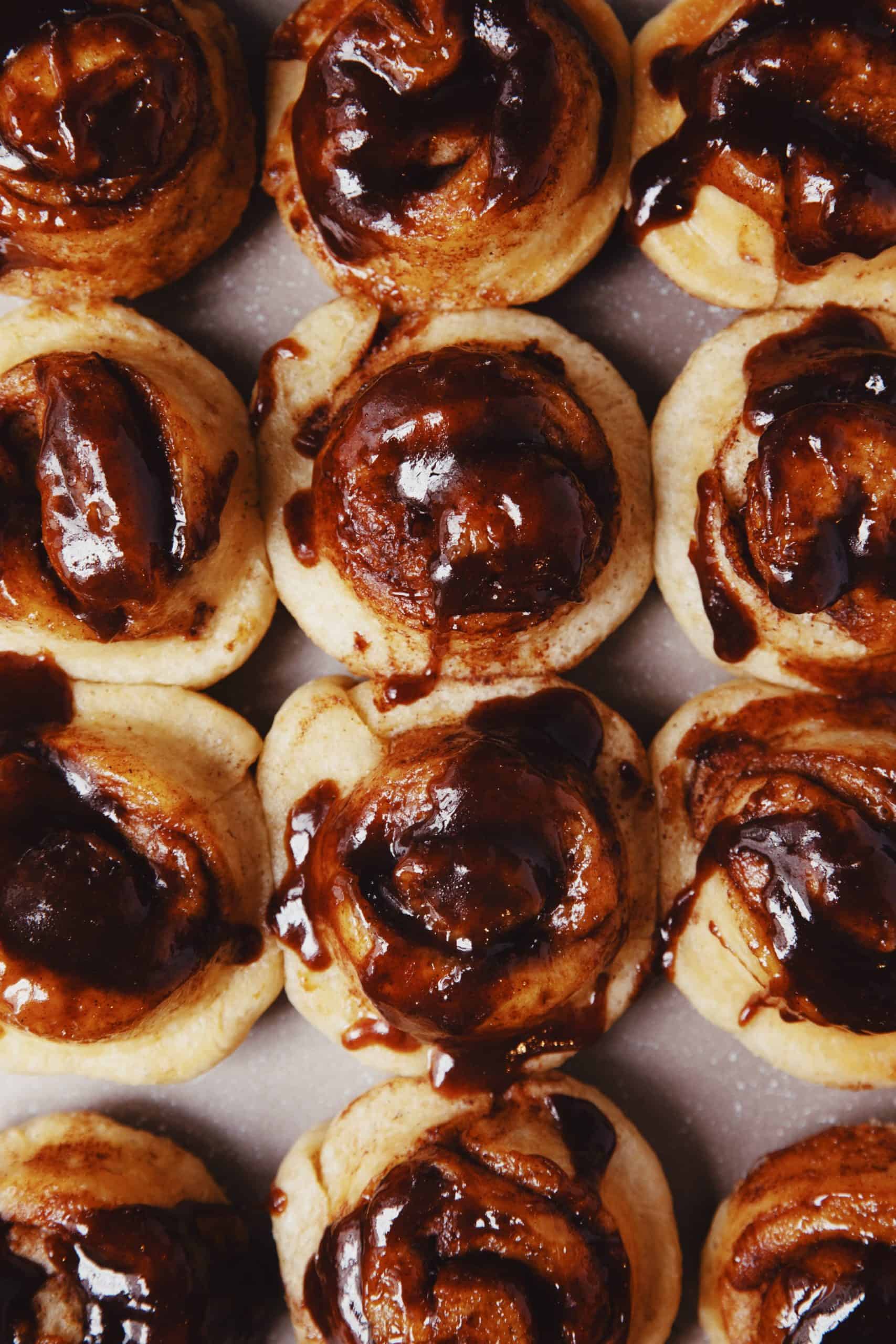 overhead of baked vegan miso caramel cinnamon rolls
