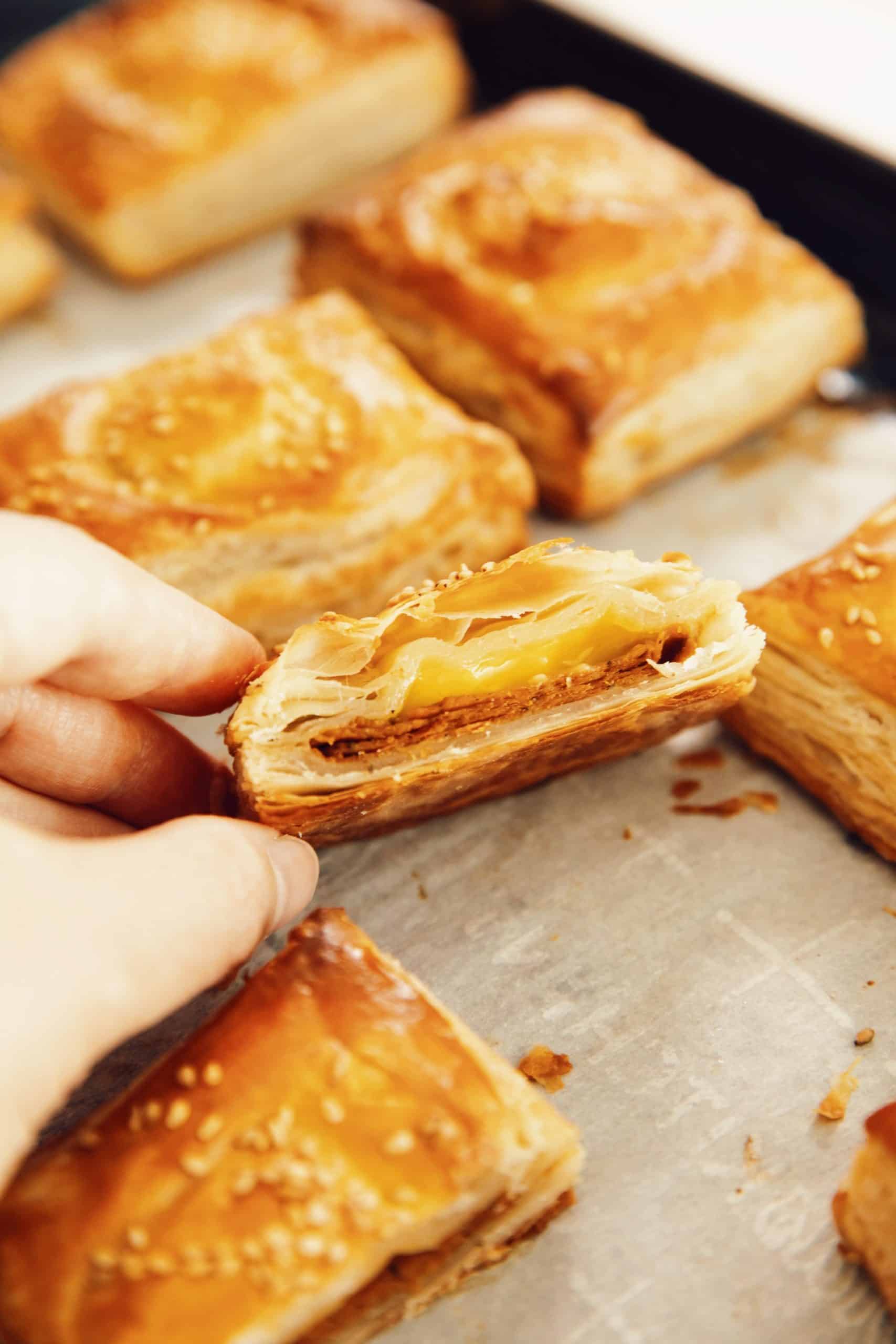 diners view showing the inside of vegan ham and cheese croissant